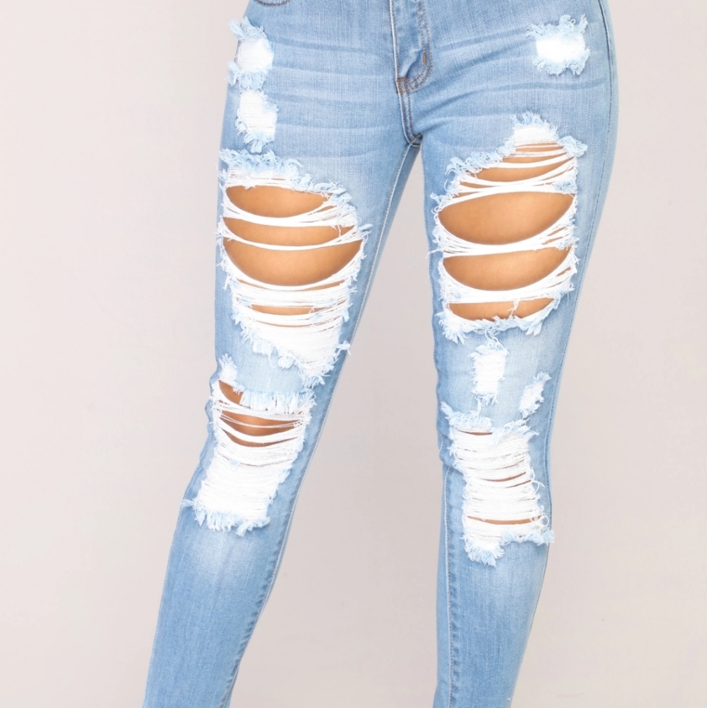 Light blue distressed jeans